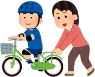 自転車の練習をしている男の子